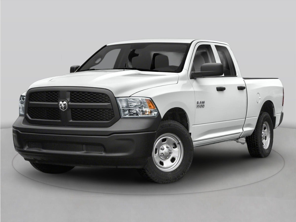 2024 RAM 1500 Classic Warlock in Diamond Black Crystal Pearlcoat — front three-quarter view